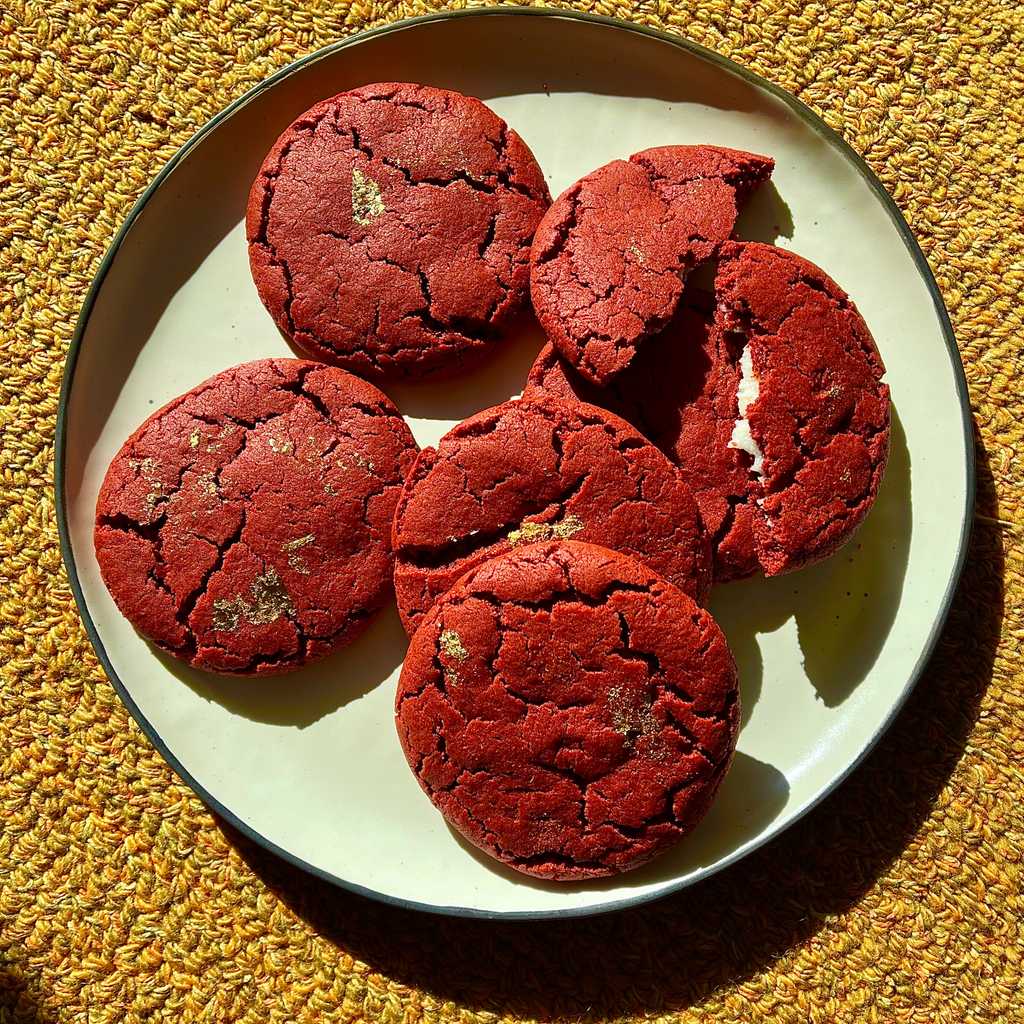 Red velvet cake has four essential characteristics. Tang from cultured dairy, acidity from vinegar, cream cheese, and enough cocoa that you can taste it. To transform this into a cookie, there are a couple changes we need to make to get the flavor right, but maintain a good cookie consistency.