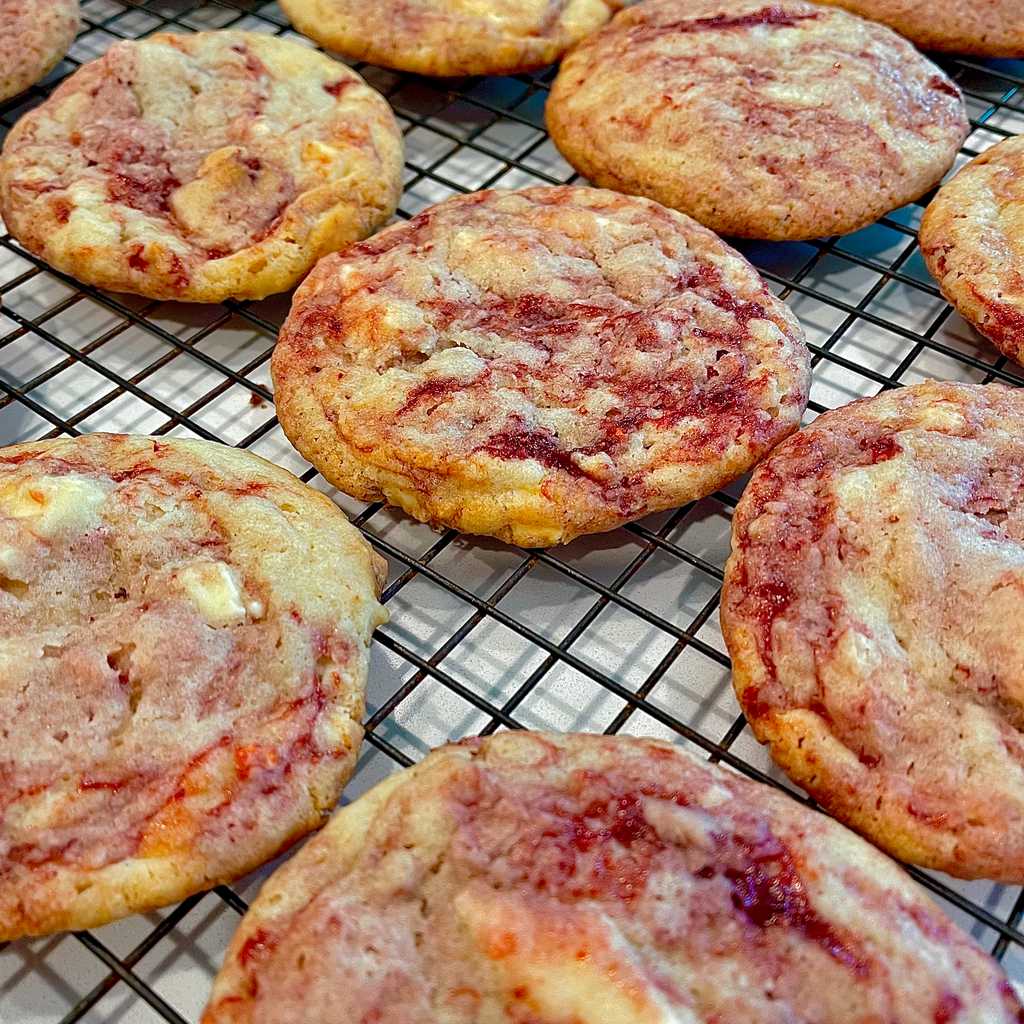 Strawberry swirled cookies with white chocolate chunks, soft middles and crispy edges