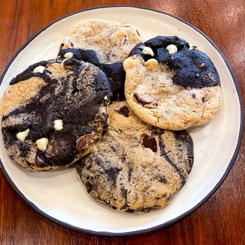 White tahini pairs nicely with bittersweet chocolate and brown sugar for a slightly nuttier and more interesting twist on a chocolate chip cookie. Crispier outside and fudgier middles are always winners.